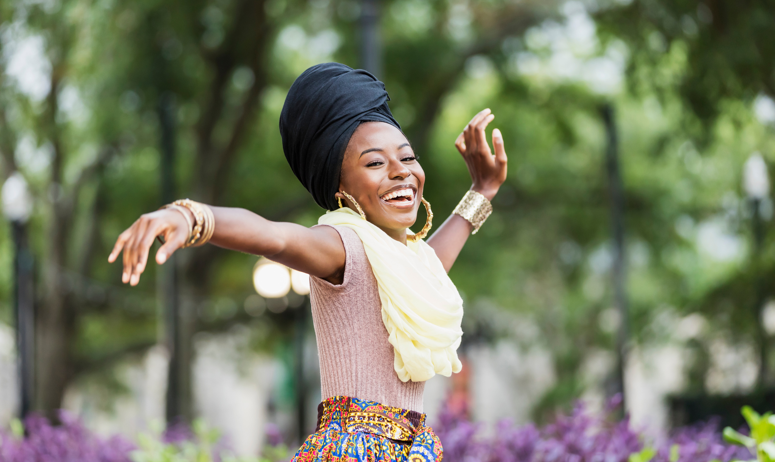 Graceful young African-American woman dancing