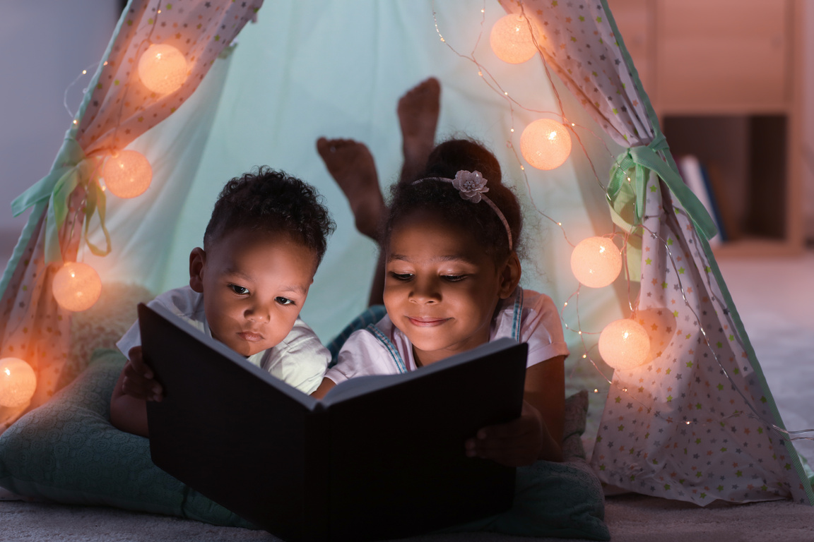 Little Children Reading Bedtime Story
